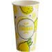 A white paper cup with lemons on it.