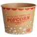 A brown and red Carnival King Kraft popcorn container with white clouds and the words "Freshly Popped Popcorn" on it.