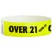 A yellow Carnival King wristband with black text that says "OVER 21"