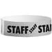 A white paper Carnival King wristband with black text that reads "STAFF" and stars.