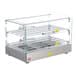 A Carnival King silver glass display case with metal racks holding hot food on a counter.