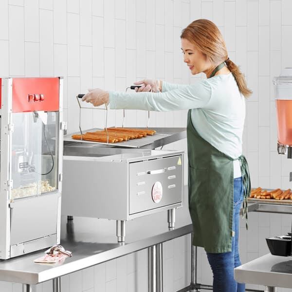 a person standing next to a table