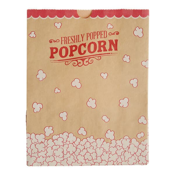 A brown Kraft paper bag with red and white text and popcorn.